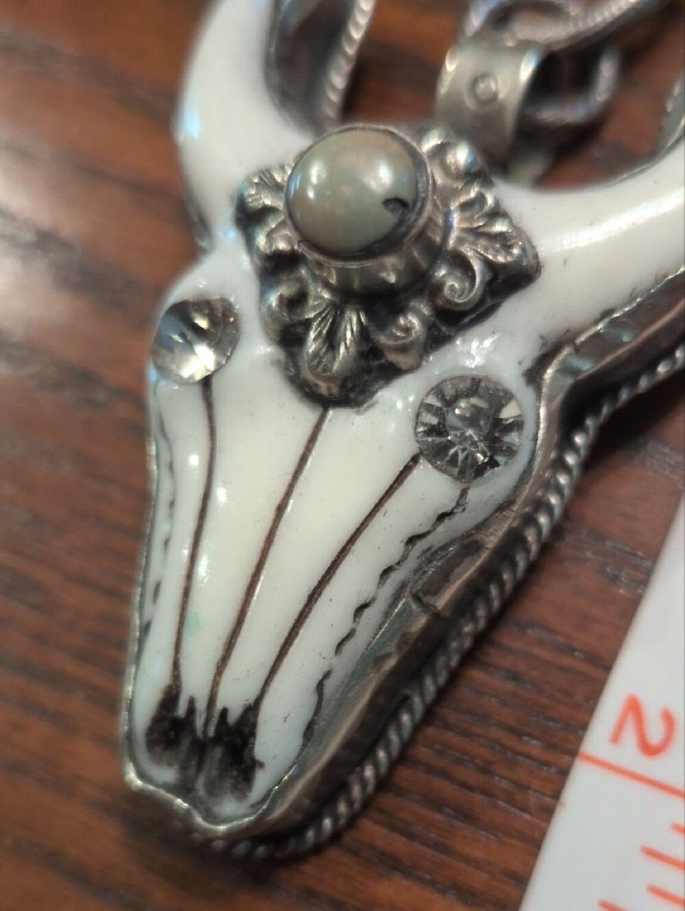 Carved Steer Cow Skull Pendant with Swarovski Eye Accent And Green Stone